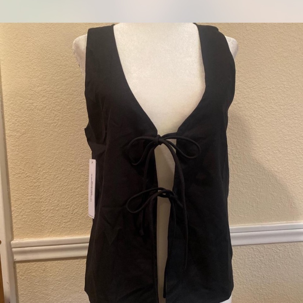Black crop top with front ties.